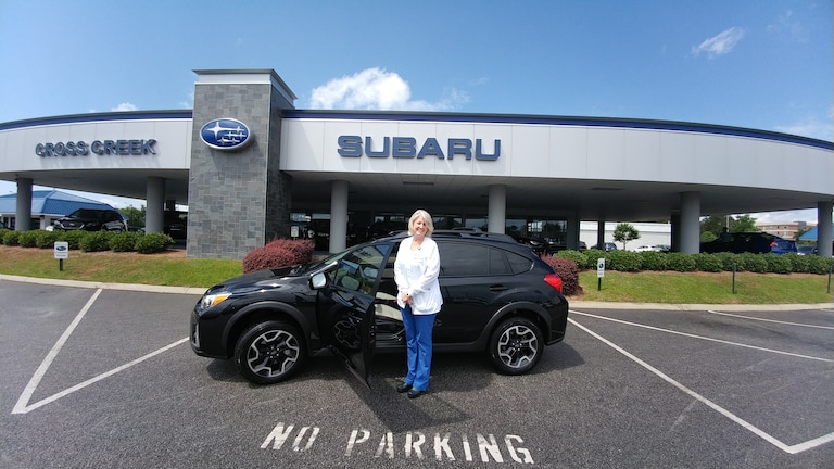 Cheryl in front of her new 2017 Crosstrek!.jpg