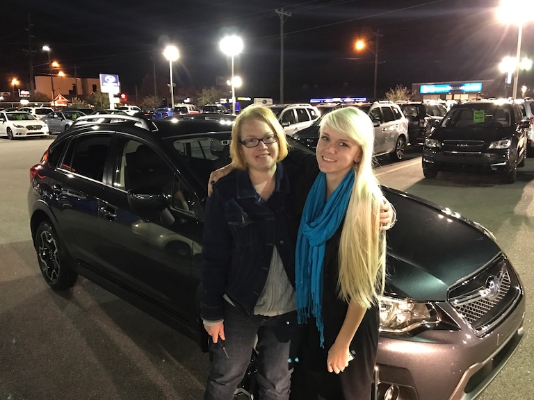 Robin with Sales Advisor Ava. Robin traded in her first Subaru - a 2010 Legacy for her second Subaru - a 2016 Subaru Crosstrek equipped with EyeSight Driver Assist Technology!.JPG