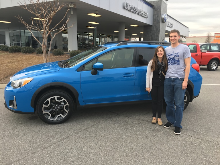 Eric & Claire with their 3rd Subaru - a 2017 Crosstrek in Hyper Blue!.JPG