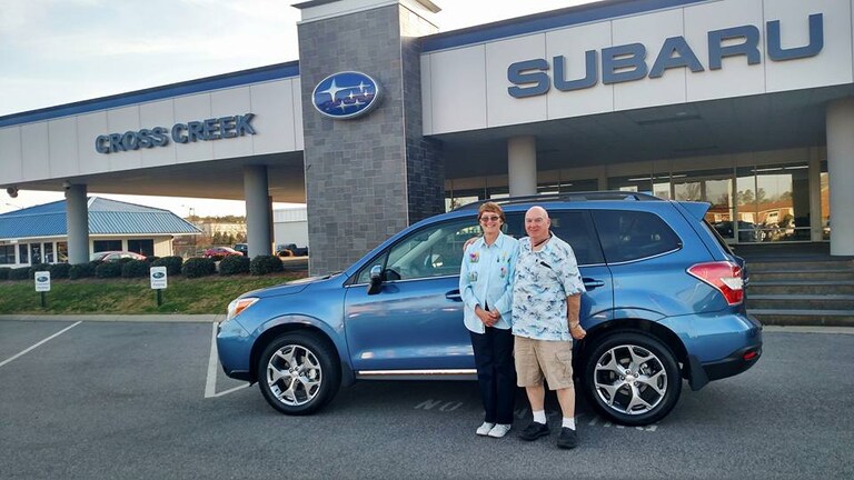 Carol & George Smith with their new Forester.jpg