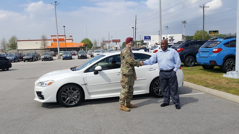 Sean Lumley shakes Sales Advisor Keith Godwins hand before driving home his new 2017 WRX #SecondSubaru.jpg