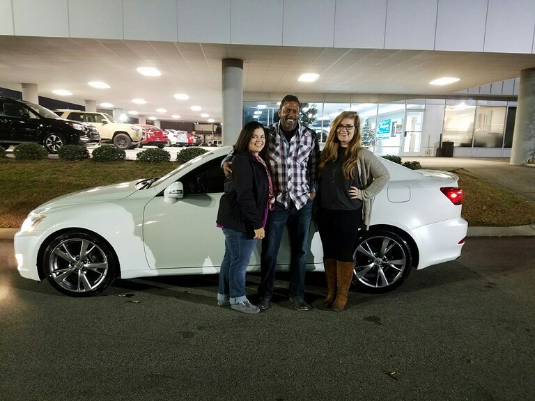 Tamara and Kevin with Senior Sales Advisor Emily Bracey in front of their new Lexus IS 250.jpg