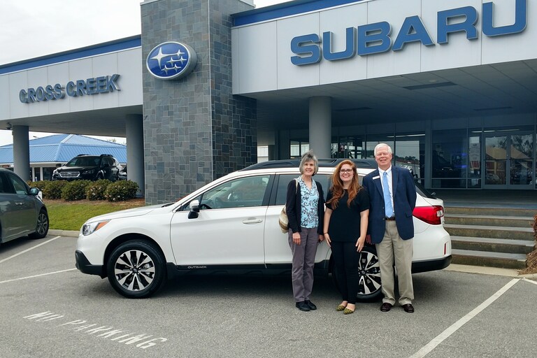 Amy & Bill Galloway with Sr Sales Advisor Emily in front of their new 2017 Subaru.jpg