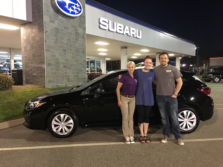 Mr & Mrs Christie with Sales Advisor Katey in front of their first Subaru - a 2017 Impreza!!.JPG