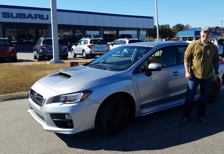 Steven Dailey with his dream car - the WRX STI #DreamsDoComeTrue.jpg