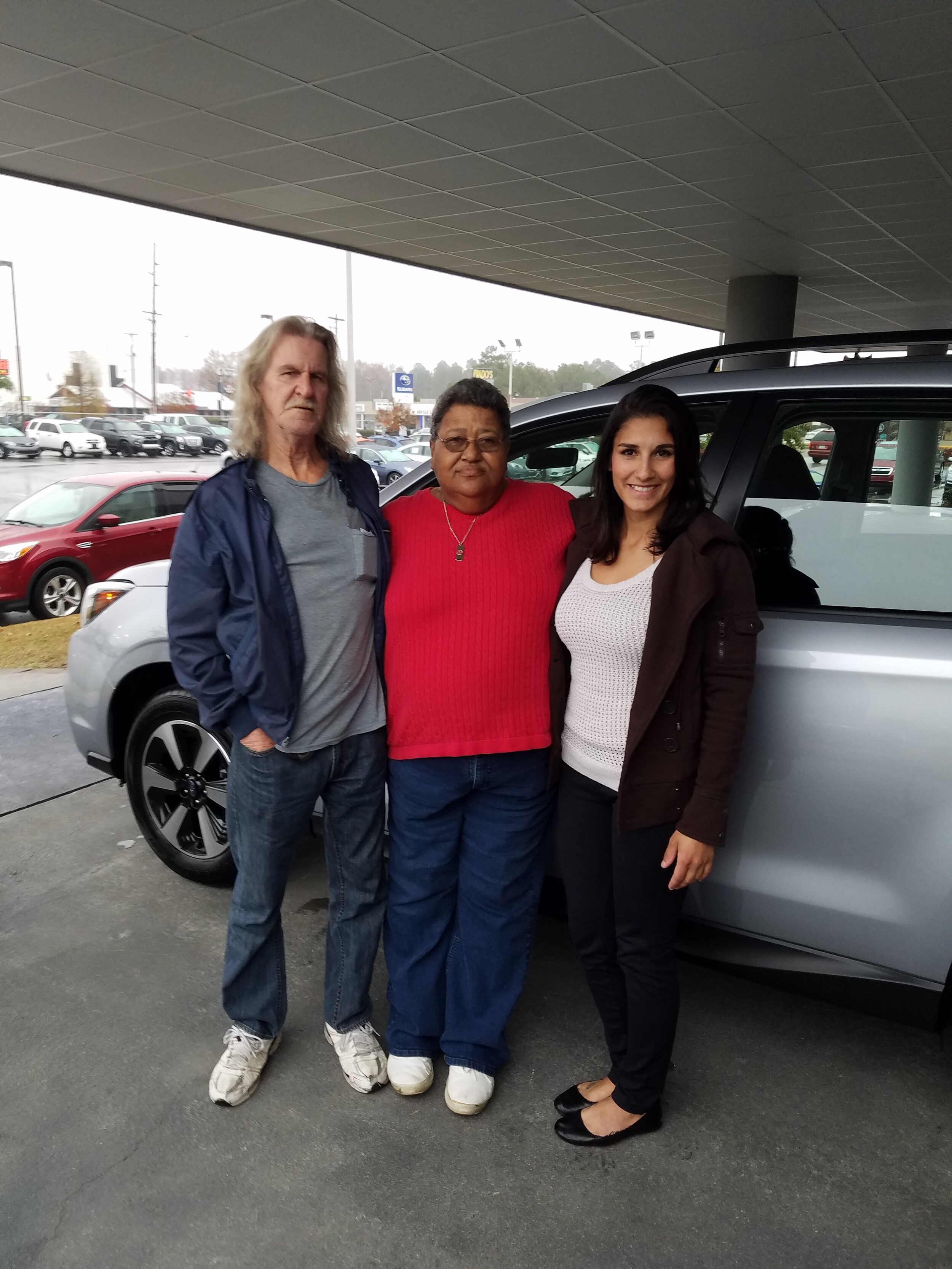 Sandra and David Matthews with Sales Advisor, Leidy Rhines. The Matthews, previously faithful Ford buyers, just purchased a 2017 Forester and love it!.jpg
