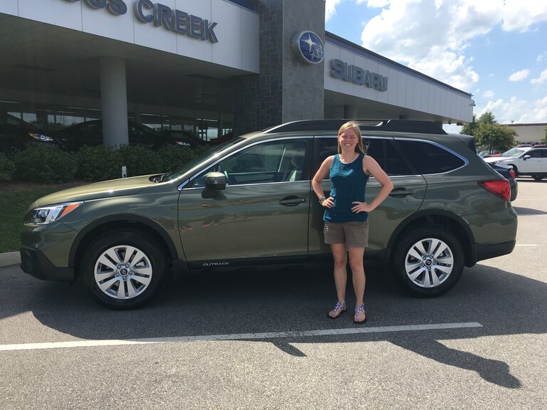 Caitlin and her new 2017 Outback.JPG