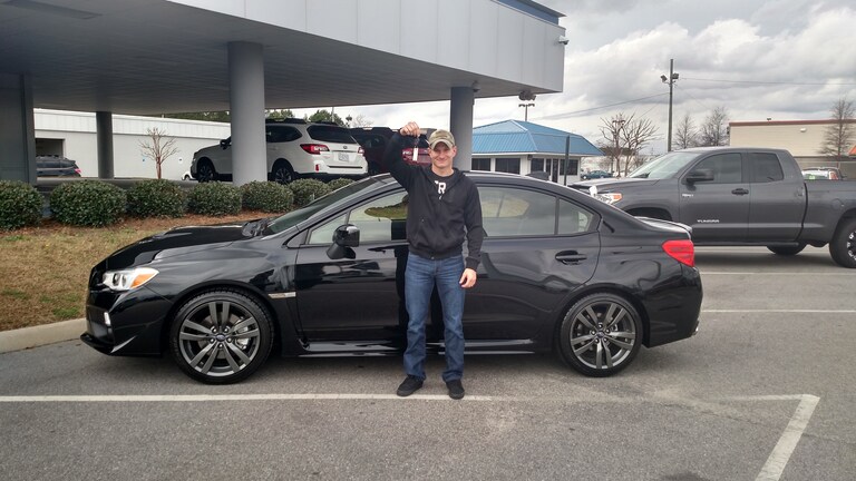 Mr Kolbie with his first Subaru - a 2017 WRX!.jpg