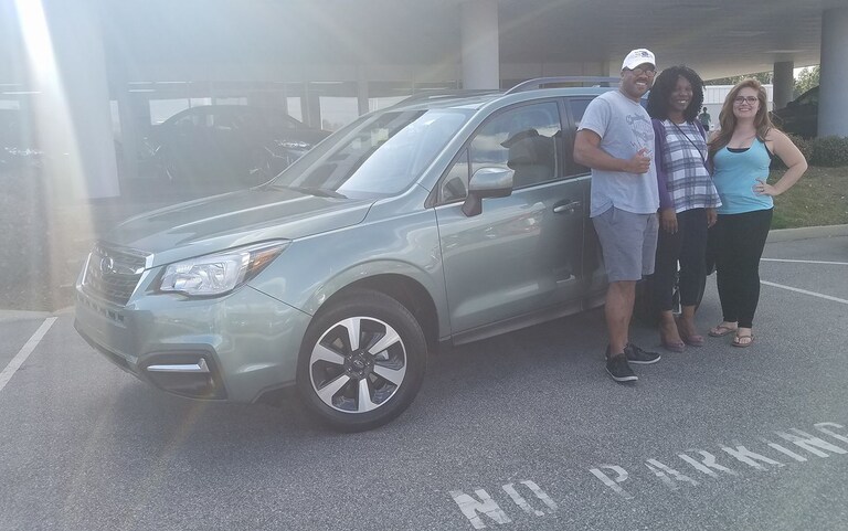Rachel & Ed with their new 2017 Forester and Sales Advisor Emily Bracey.jpg