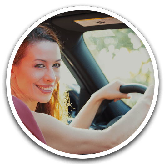 After the sale, woman driving home in new car