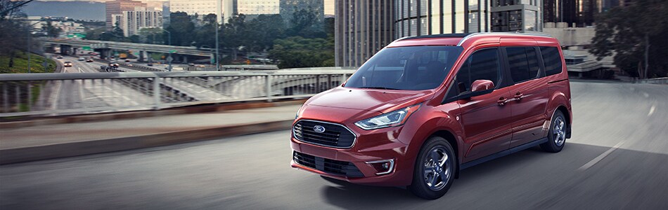 2019-Ford-TransitConnect-Titanium-Van-L02.jpg Ford Transit Van driving through the city