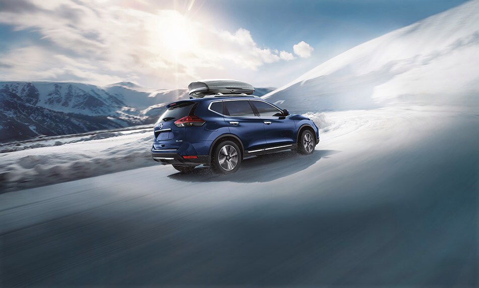 2020-nissan-rogue-handling-blue-exterior.jpg