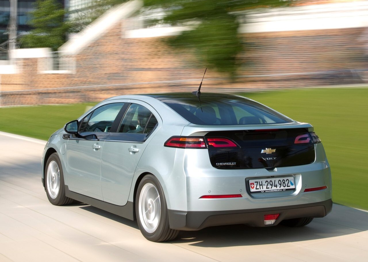Chevrolet-Volt-2011-1280-5c.jpg A 2011 Chevy Volt driving through city streets.