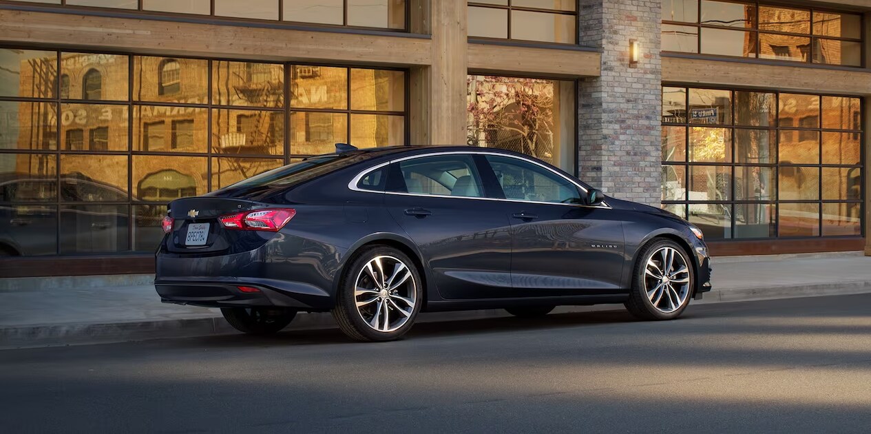 2023-chevy-malibu-1.PNG A profile view of a black 2023 Chevy Malibu