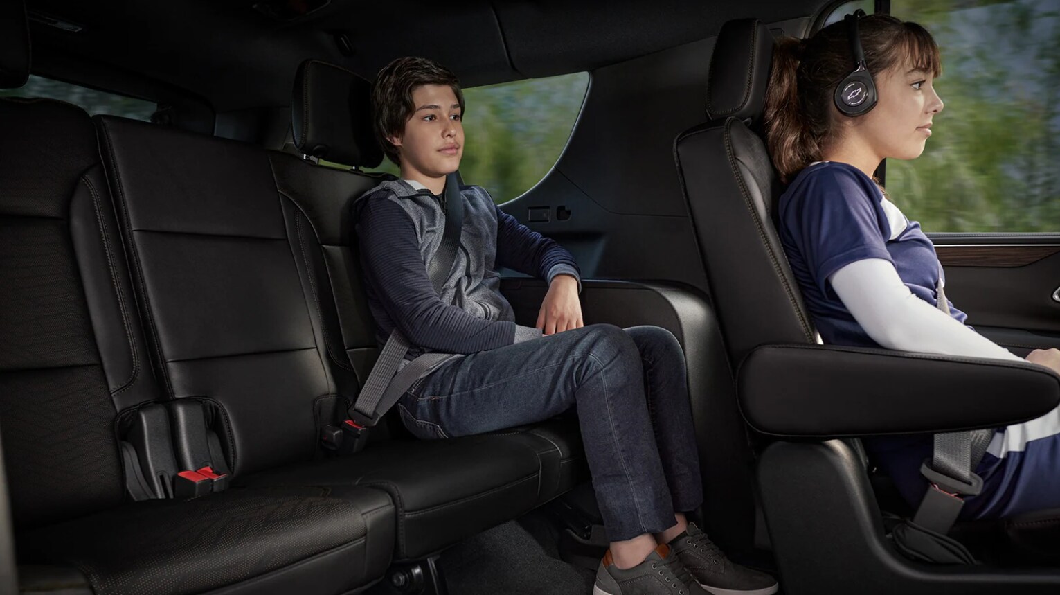 2022-Chevy-Tahoe-06.png Two kids sitting in the new Chevy Tahoe 2022