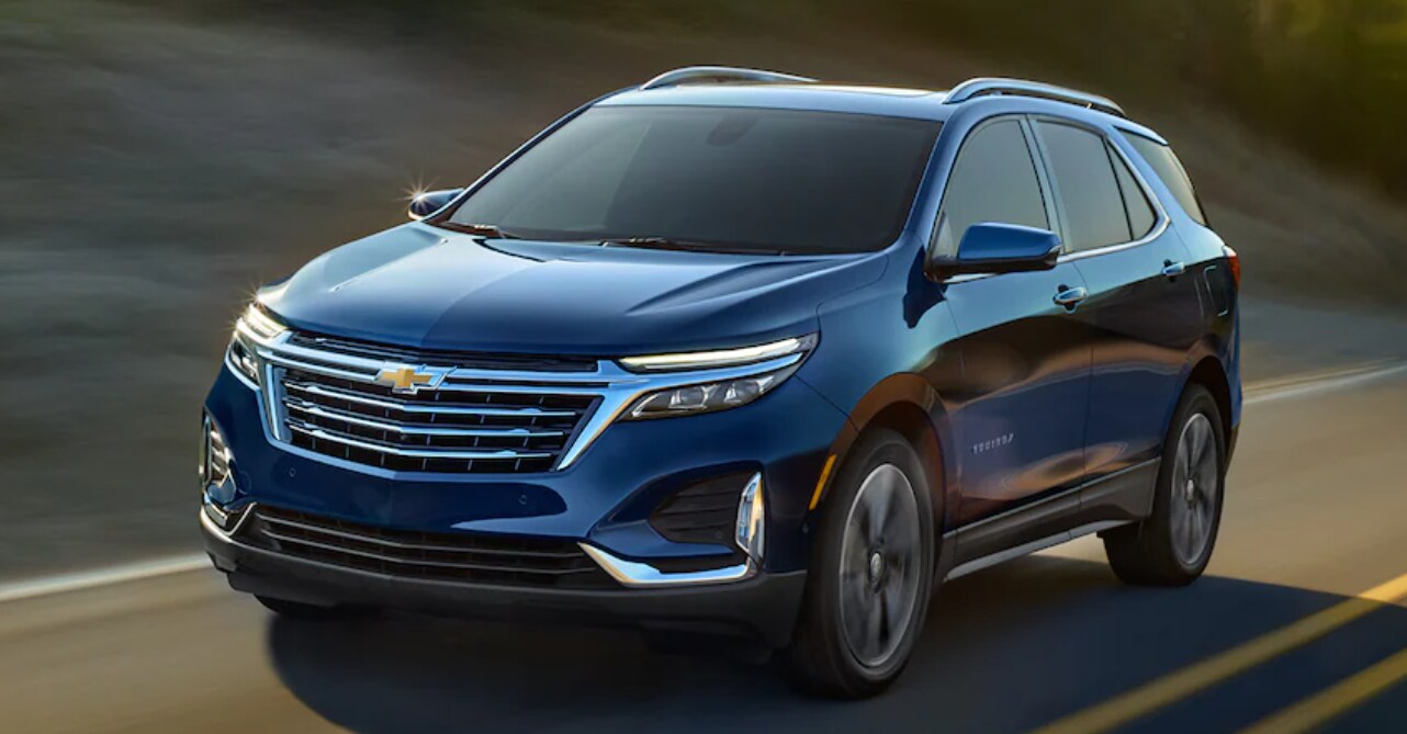 Chevy Equinox.PNG 2023-chevy-equinox-driving-down-the-road