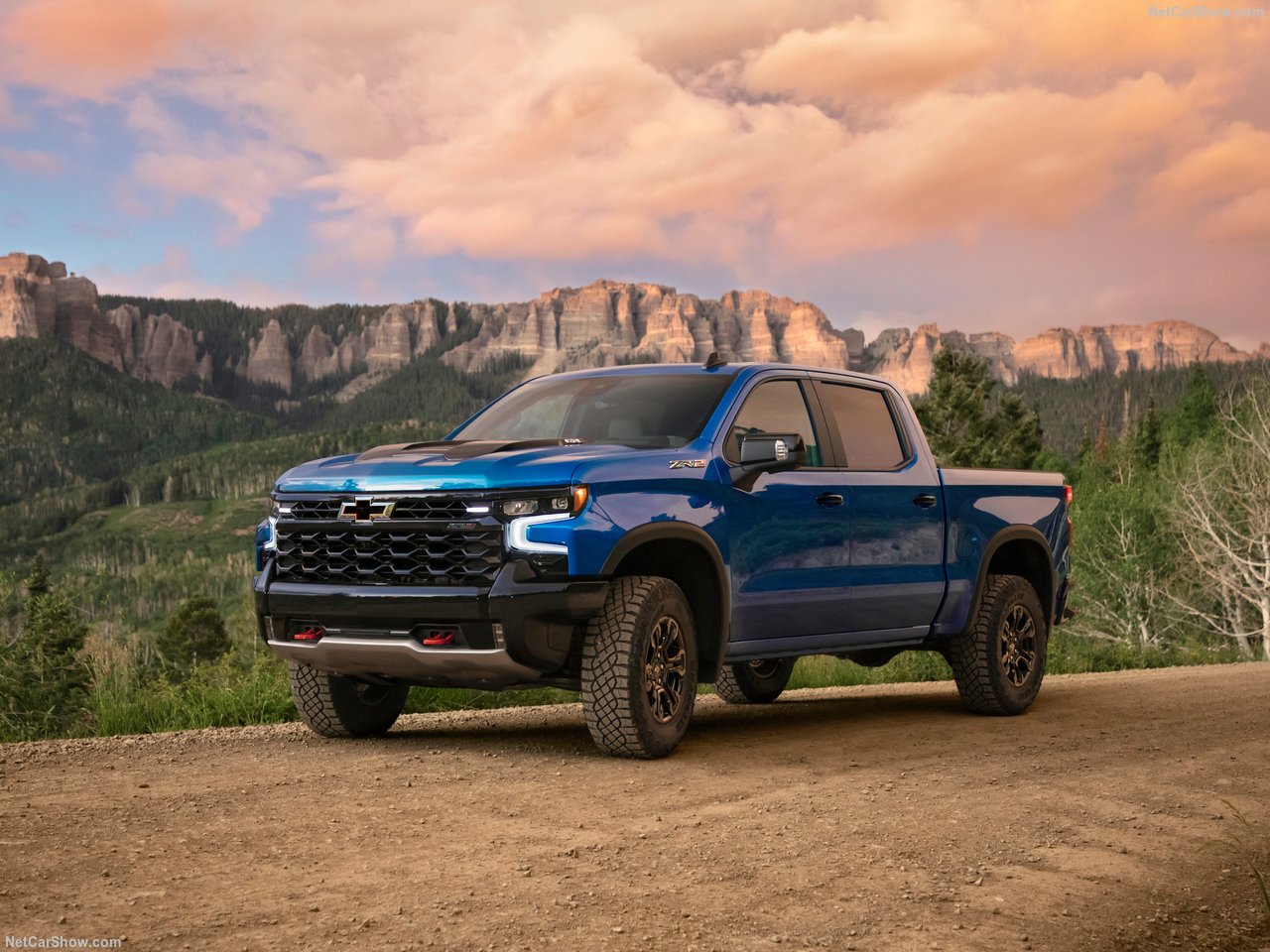 2026 Chevrolet Silverado in a bold color showing its commanding front grille and design