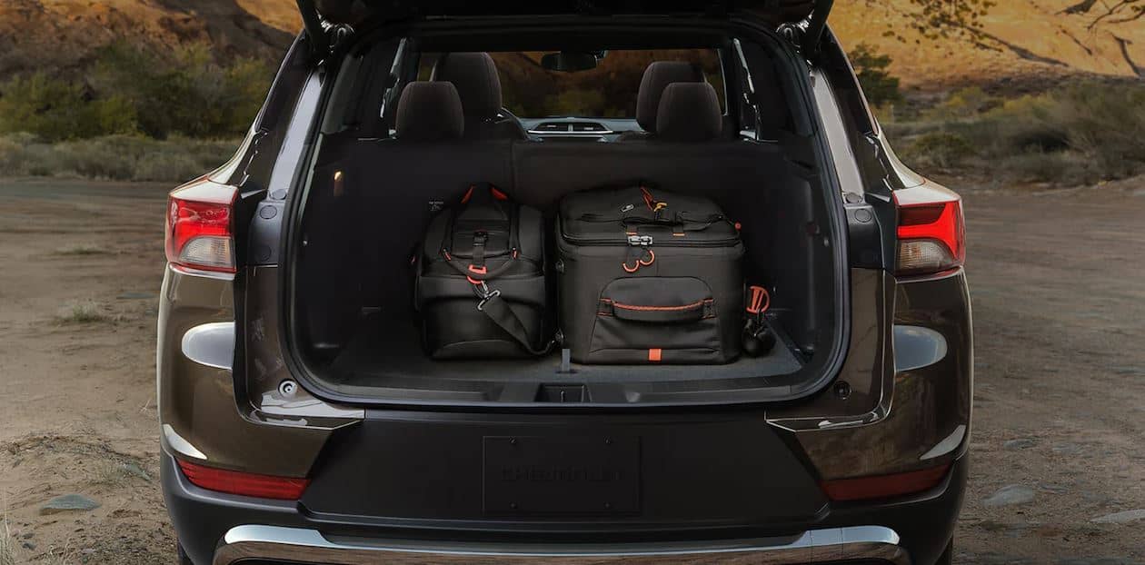 2022 Chevy Trailblazer Storage a 2022 Chevy Trailblazer parked in an empty lot with the trunk open, revealing the storage space in back