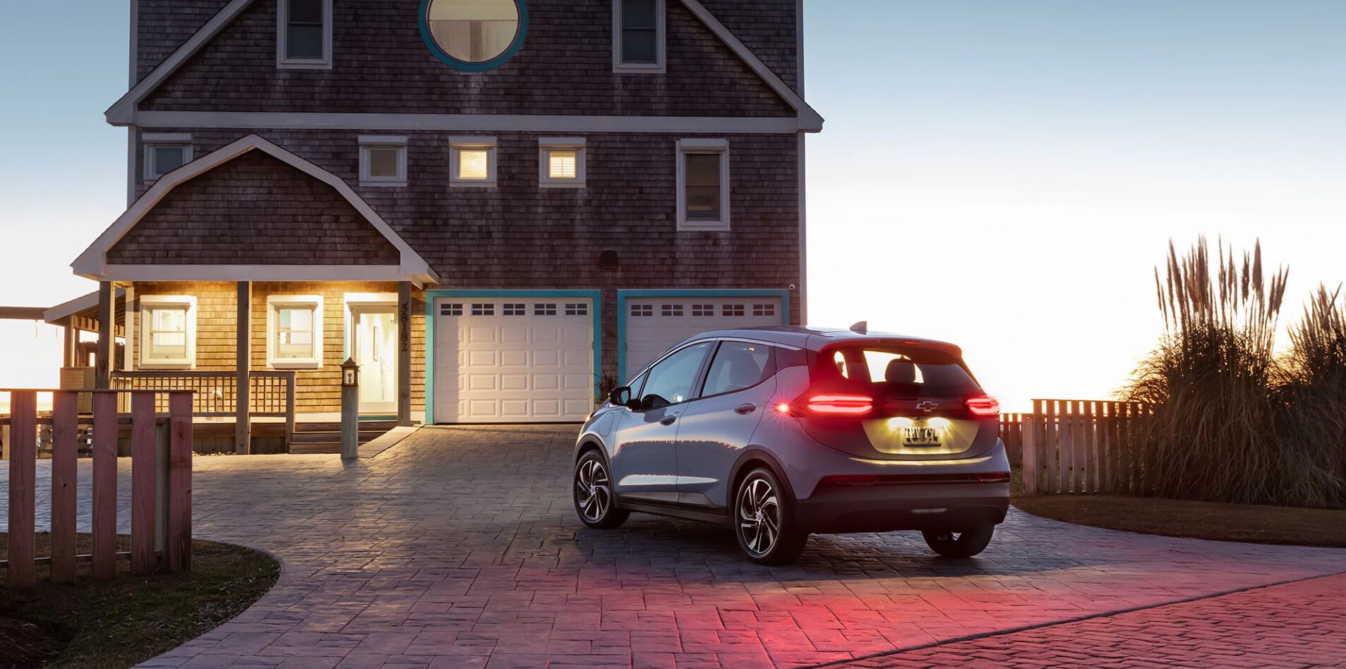 2022-Chevy-Bolt-2.PNG new-chevy-bolt-ev-parked-infront-of-house