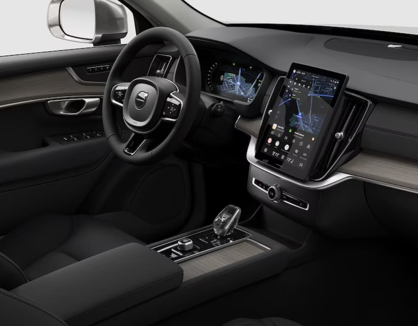 Volvo XC90 Plug-In Hybrid cockpit featuring a digital driver display, vertical center touchscreen, and wood-trimmed dashboard.