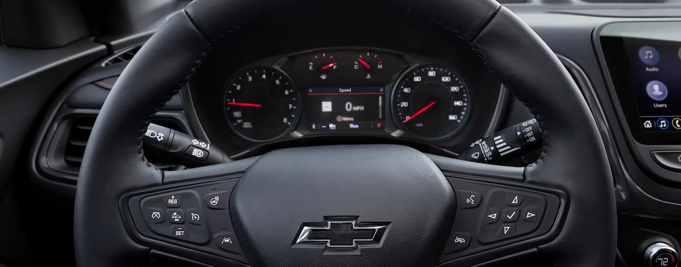 A close up shows the gauge cluster in a 2023 Chevy Equinox.