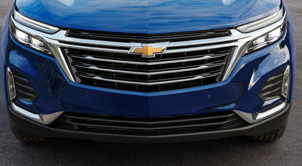 A close up of the grille on a blue 2023 Chevy Equinox for sale near Reynoldsburg, OH is showm.