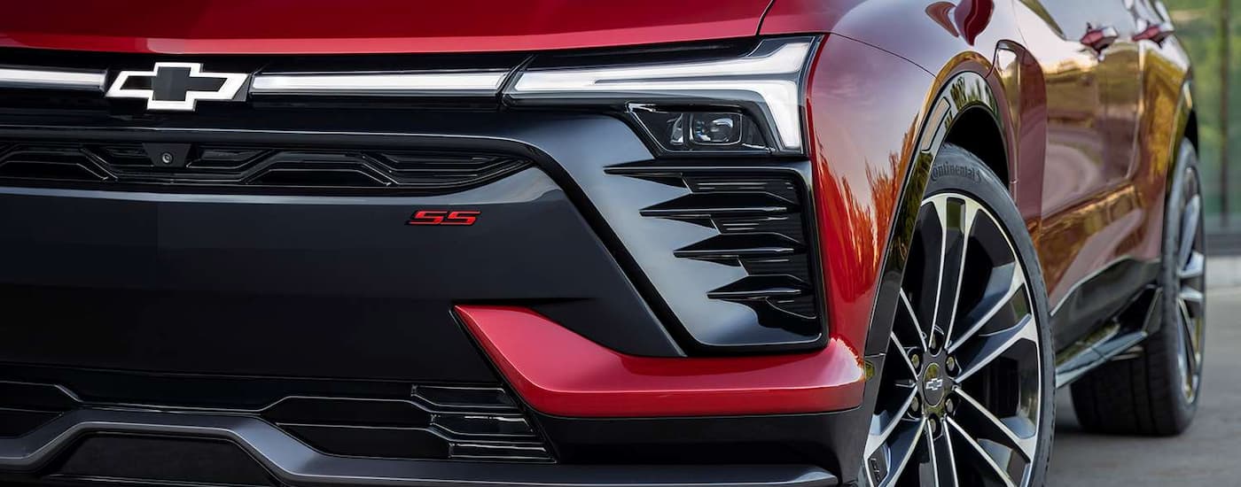 A close up of the grille on a red 2024 Chevy Blazer EV SS is shown. id=