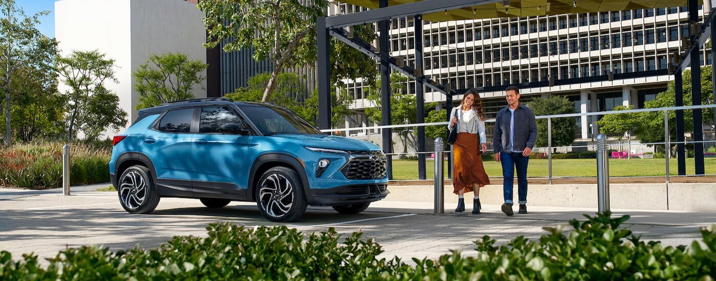 2025%20Chevy%20Trailblazer%20RS%20-%20Blue.jpg A blue 2025 Chevy Trailblazer RS is shown parked near two people walking.