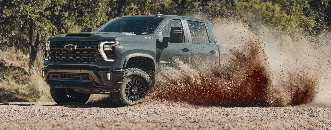2026%20Chevy%20Silverado%202500%20in%20mud.webp Chevy silverado 2500 HD driving through mud - Dave Gill chevy