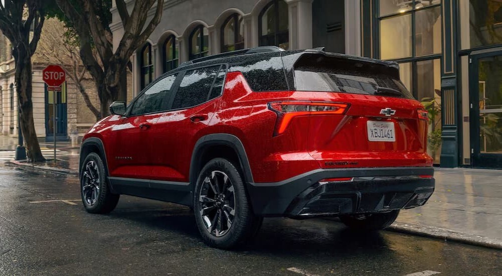 2025%20Chevy%20Equinox%20Rs%20-%20Red.jpg A red 2025 Chevy Equinox RS is shown parked near a stop sign.