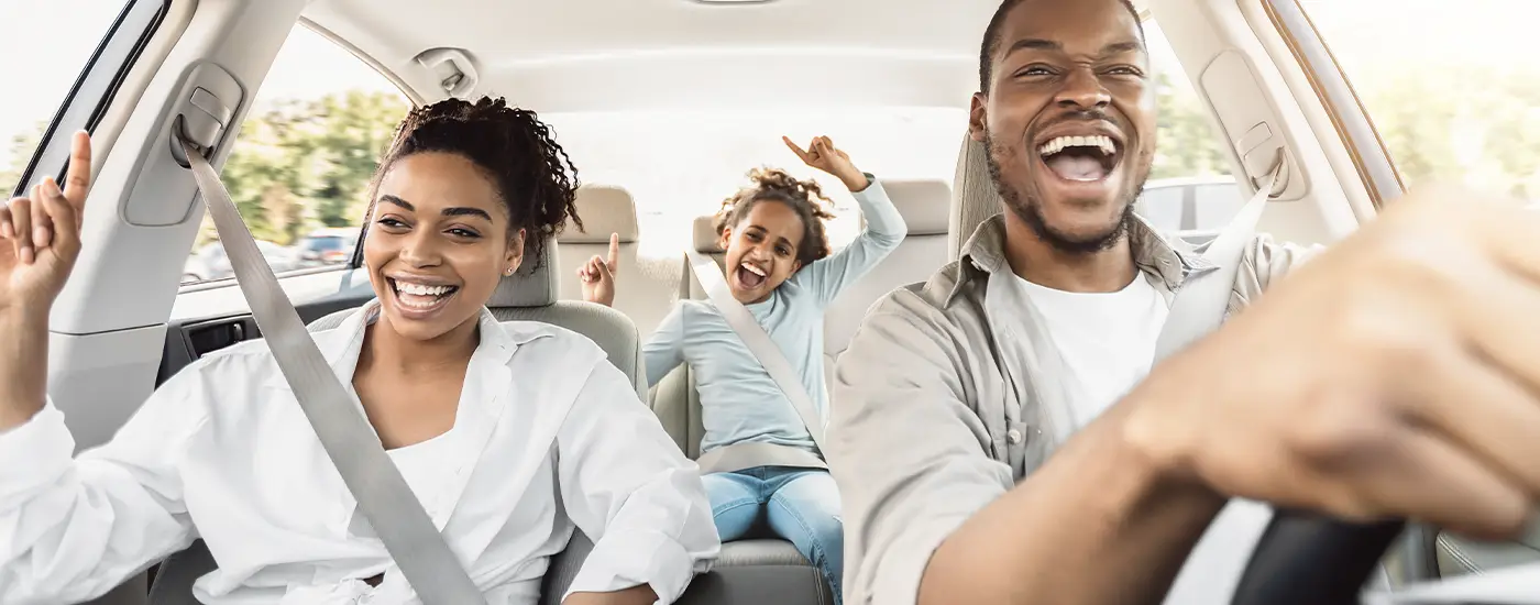 Happy Columbus Ohio family at Dave Gill Chevrolet - finding the right vehicle for their changing needs