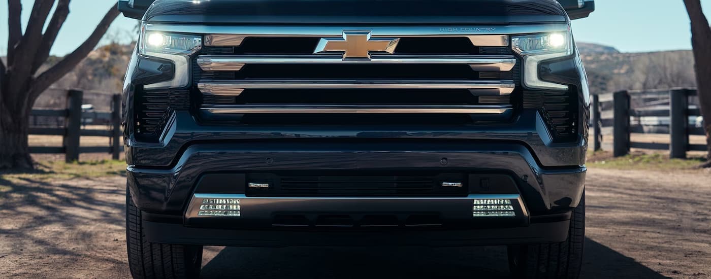 A close up of the front of a 2024 Chevy Silverado 1500 High Country is shown.