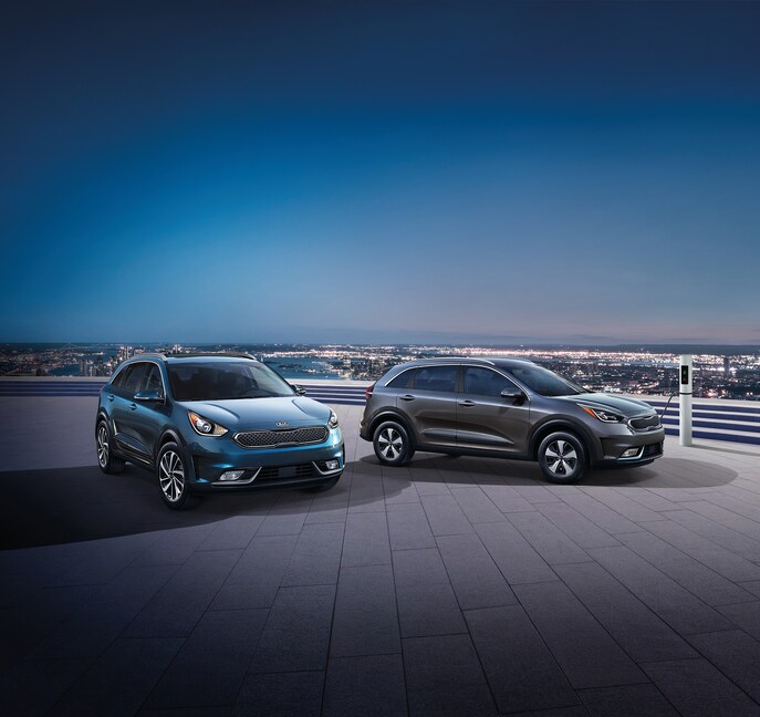 2022-KIA-NiroPlugIn-Lineup-L01.png blue and dark gray Kia Niro Plug In hybrid and electric vehicles