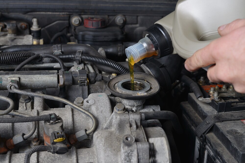 Adding oil to engine