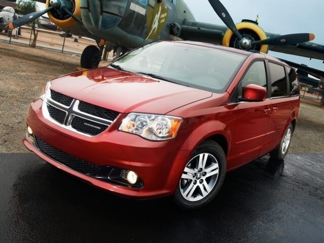 2016 Dodge Grand Caravan red with airplane in background.jpg
