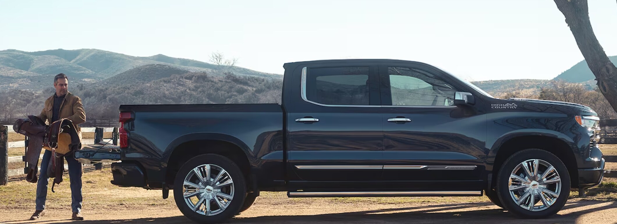 Chevy Silverado 1500 Towing Capacity 2024 Chevrolet Silverado 1500 parked in a dirt lot