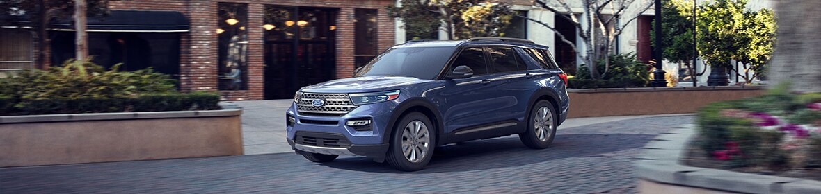 2020-Ford-Explorer-Limited-SUV-L01.jpg Ford Explorer driving in the city
