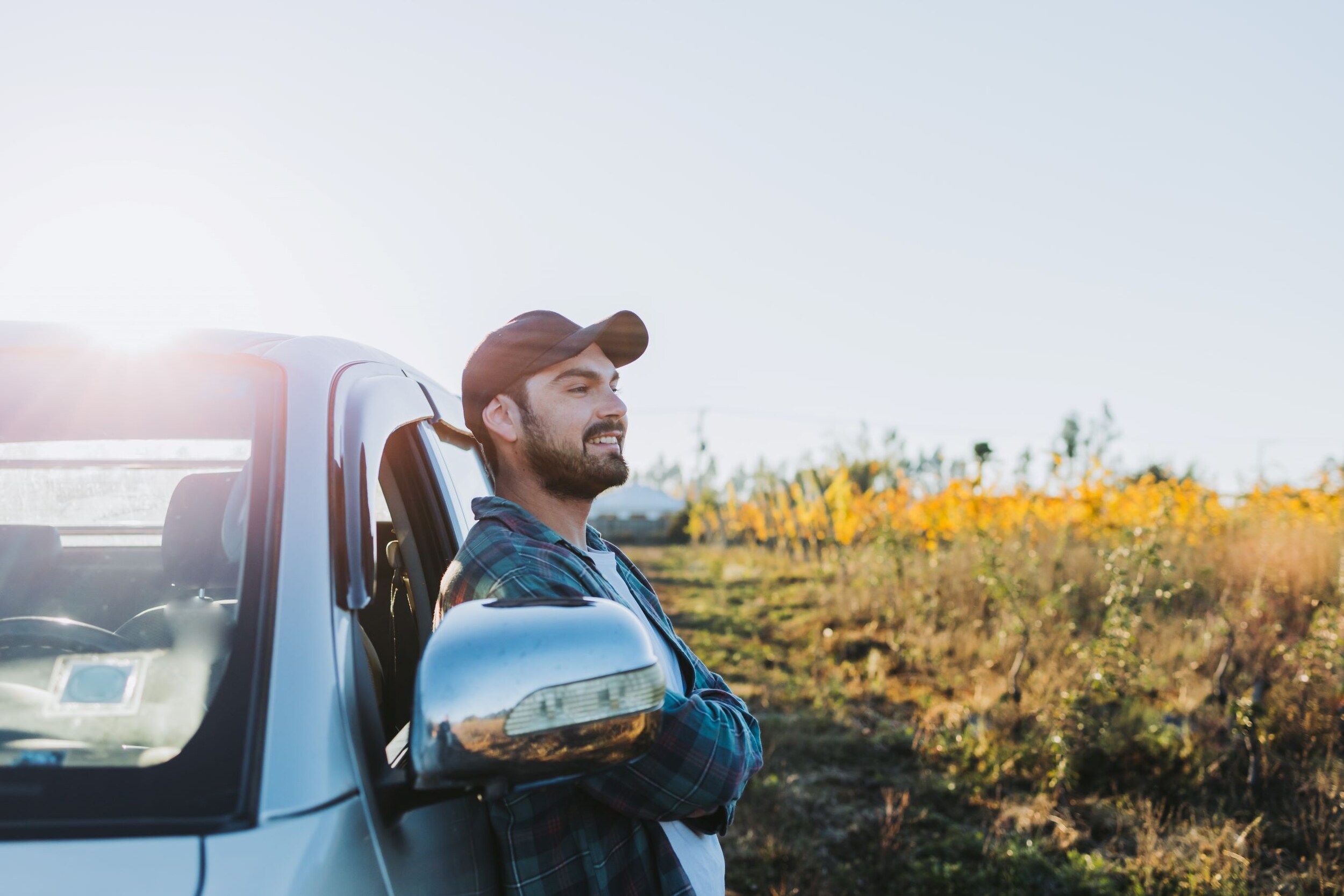 young-latin-farmer-man-leaning-his-pickup-truck-looking-his-plantations_resized.jpg