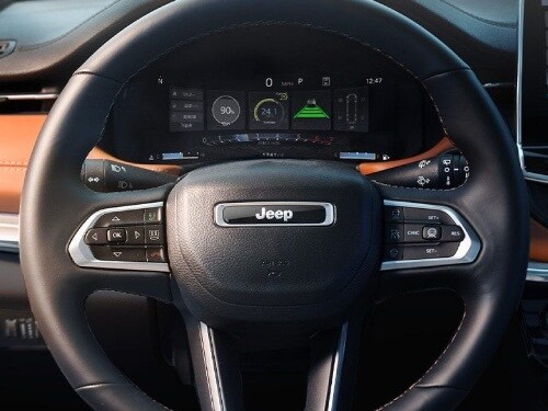 Close up view of steering wheel in 2025 Jeep Compass