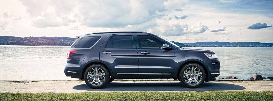 2018 Ford Explorer parked next to a lake