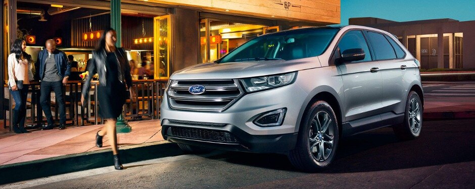 2018 Ford Edge parked on the street next to a restaurant