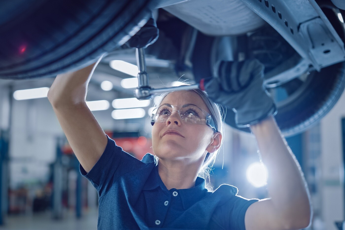 Female Mechanic under Car 1400.jpg