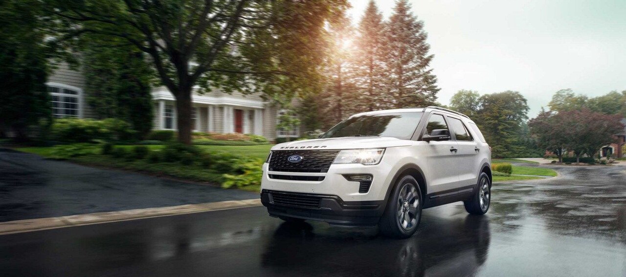 2019 Ford Explorer drives down residential street