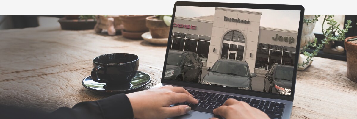 NY Jeep Dealership Shop at Home Program Shopping on computer