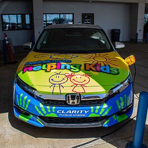 honda-premium-amenities-helping-kids-shuttle-car-dealership-evansville.jpg.JPG