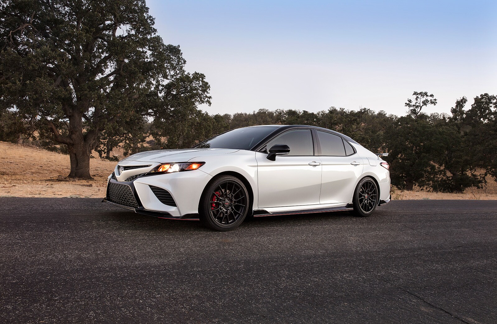 Model Features of the 2020 Toyota Camry at Johnstons Toyota of New Hampton | side profile of the 2020 camry
