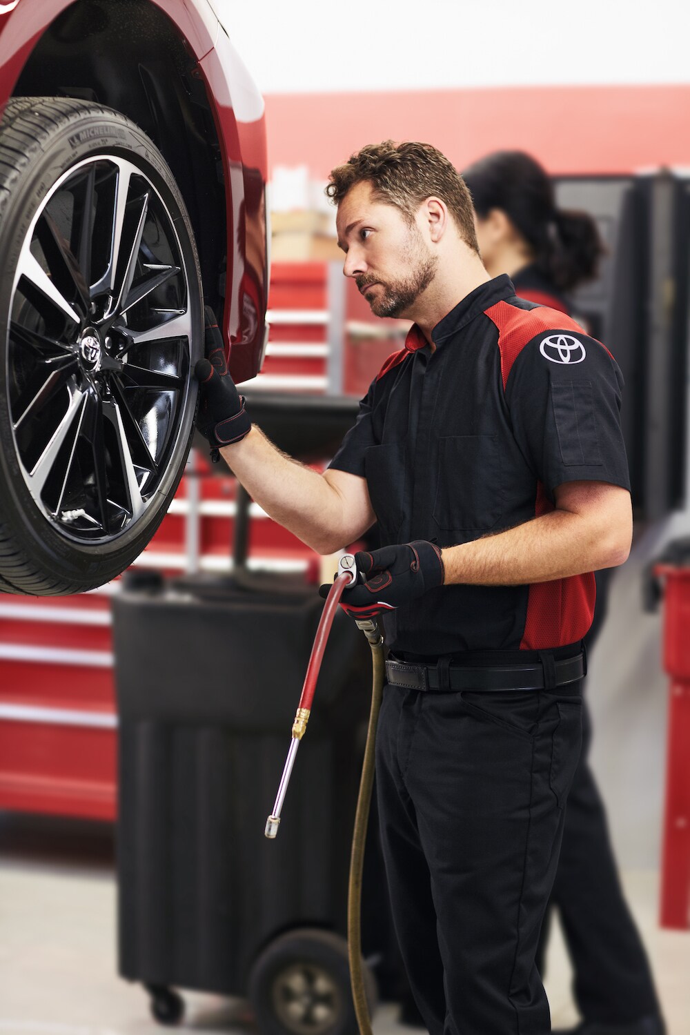 How to check your tires' health at Johnstons Toyota of New Hampton | Toyota Technician checking car tire How to check your tires' health at Johnstons Toyota of New Hampton | Toyota Technician checking car tire