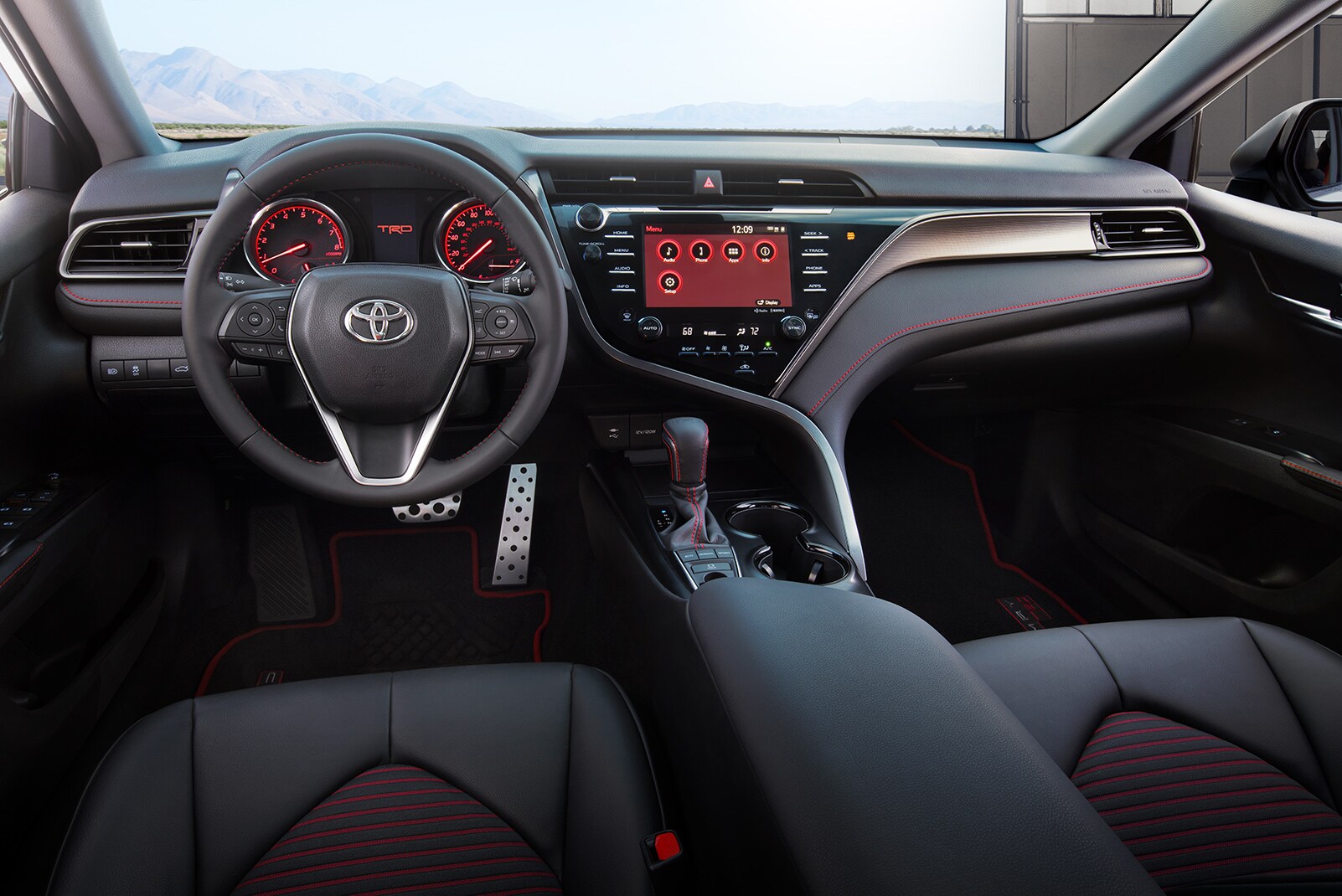 Model Features of the 2020 Toyota Camry at Johnstons Toyota of New Hampton | The dashboard of the 2020 camry