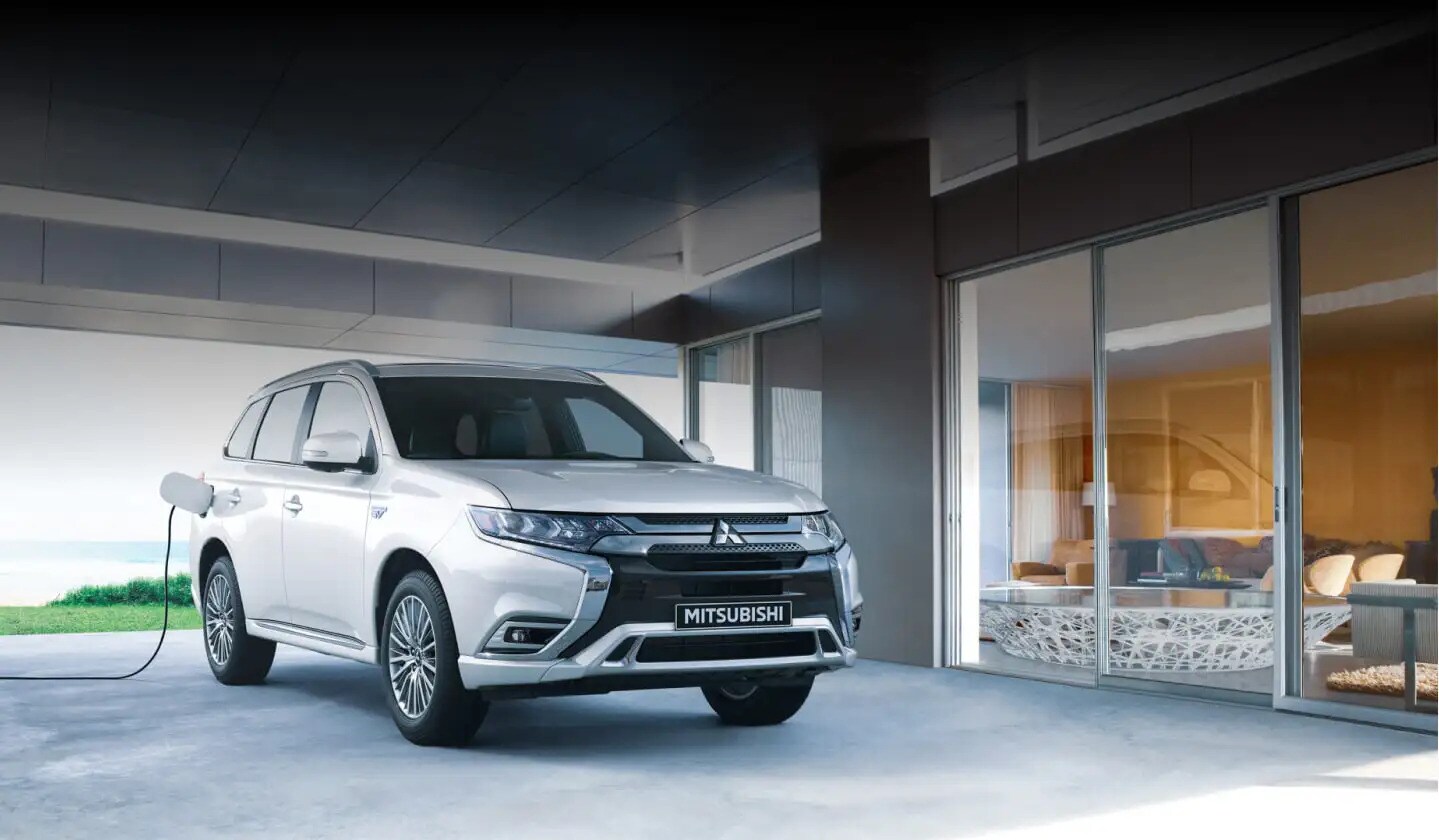 2022-mitsubishi-outlander-phev-white-charging-d.jpg