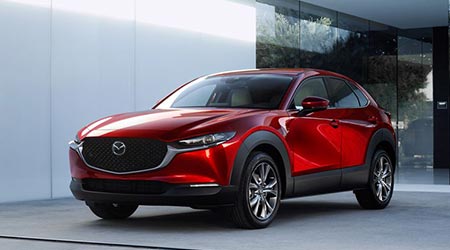 cx30.jpg red new 2020 mazda cx30 in gray showroom in florida